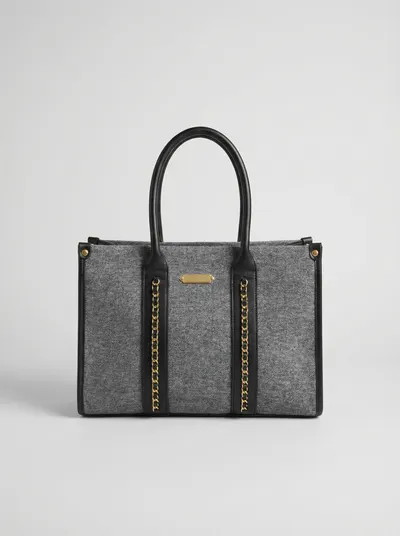 شنطة لون اسود مونس