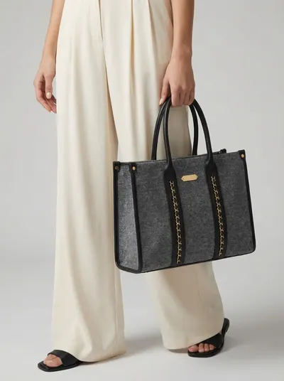 شنطة لون اسود مونس