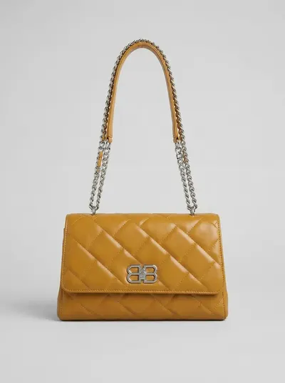 شنطة لون كموني