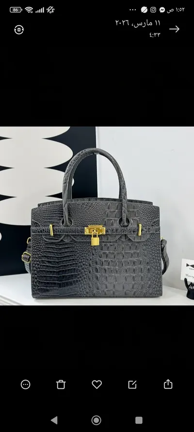 شنطة لون رمادي