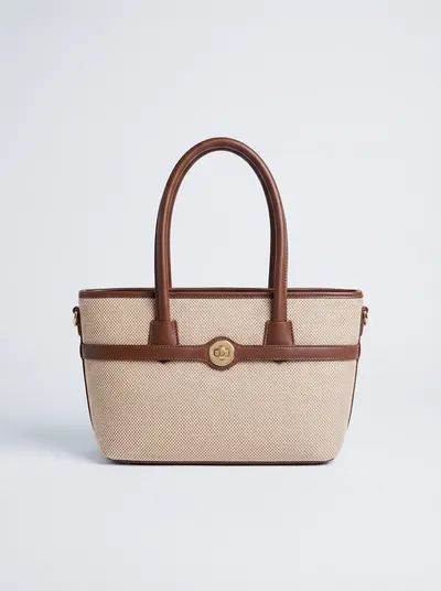 شنطة لون بيج وبني