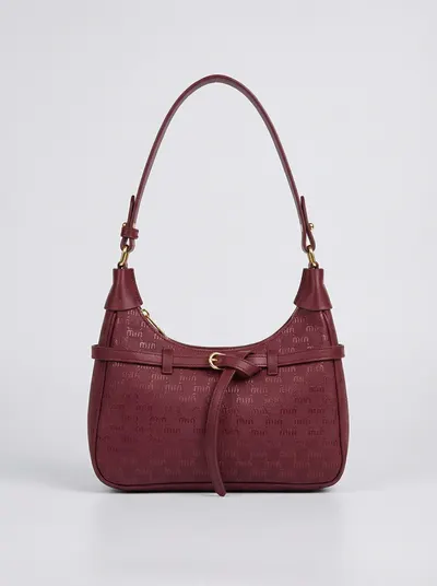 شنطة لون خمري