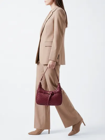 شنطة لون خمري