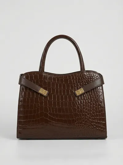 شنطة لون بني